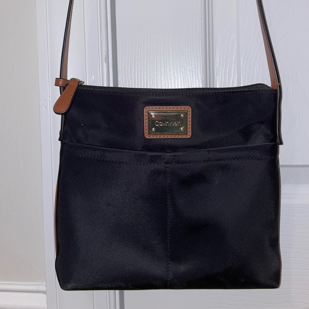 Calvin Klein nylon with leather strap crossbody. Like new condition. Barely used